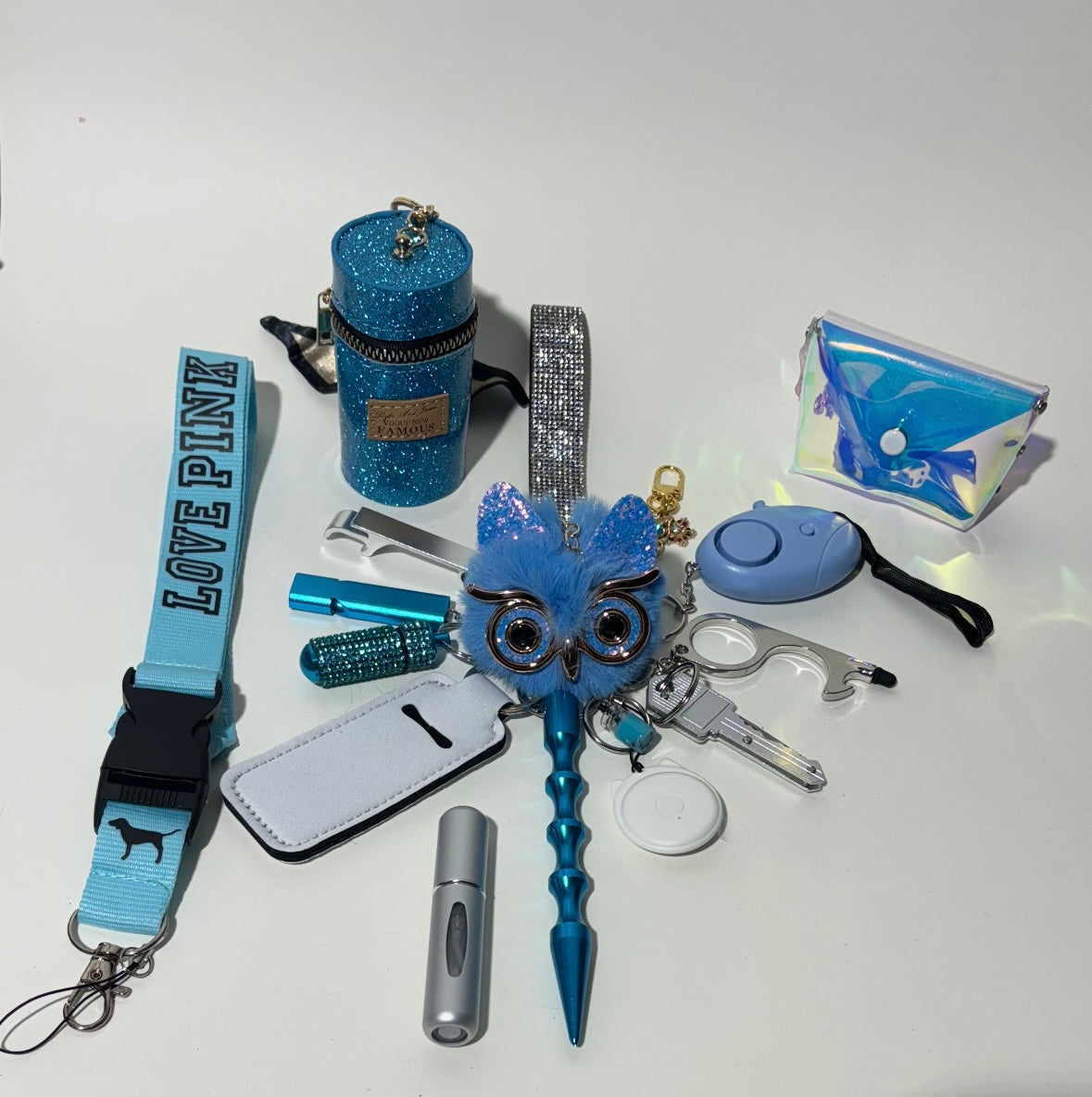 Trendy zelfverdedigings sleutelhanger blauw met beetje bling