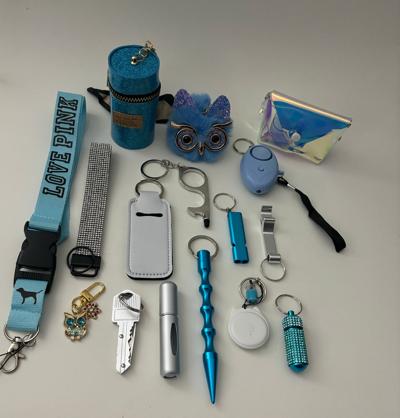 Trendy zelfverdedigings sleutelhanger blauw met beetje bling